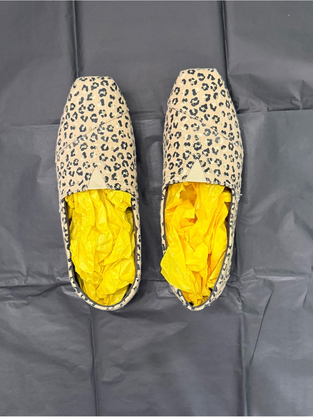 Toms Leopard Print Slip-On Flats in Beige and Black